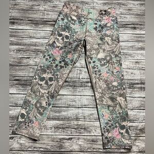 Women’s Large Evolution & Creation skulls & floral leggings excellent condition